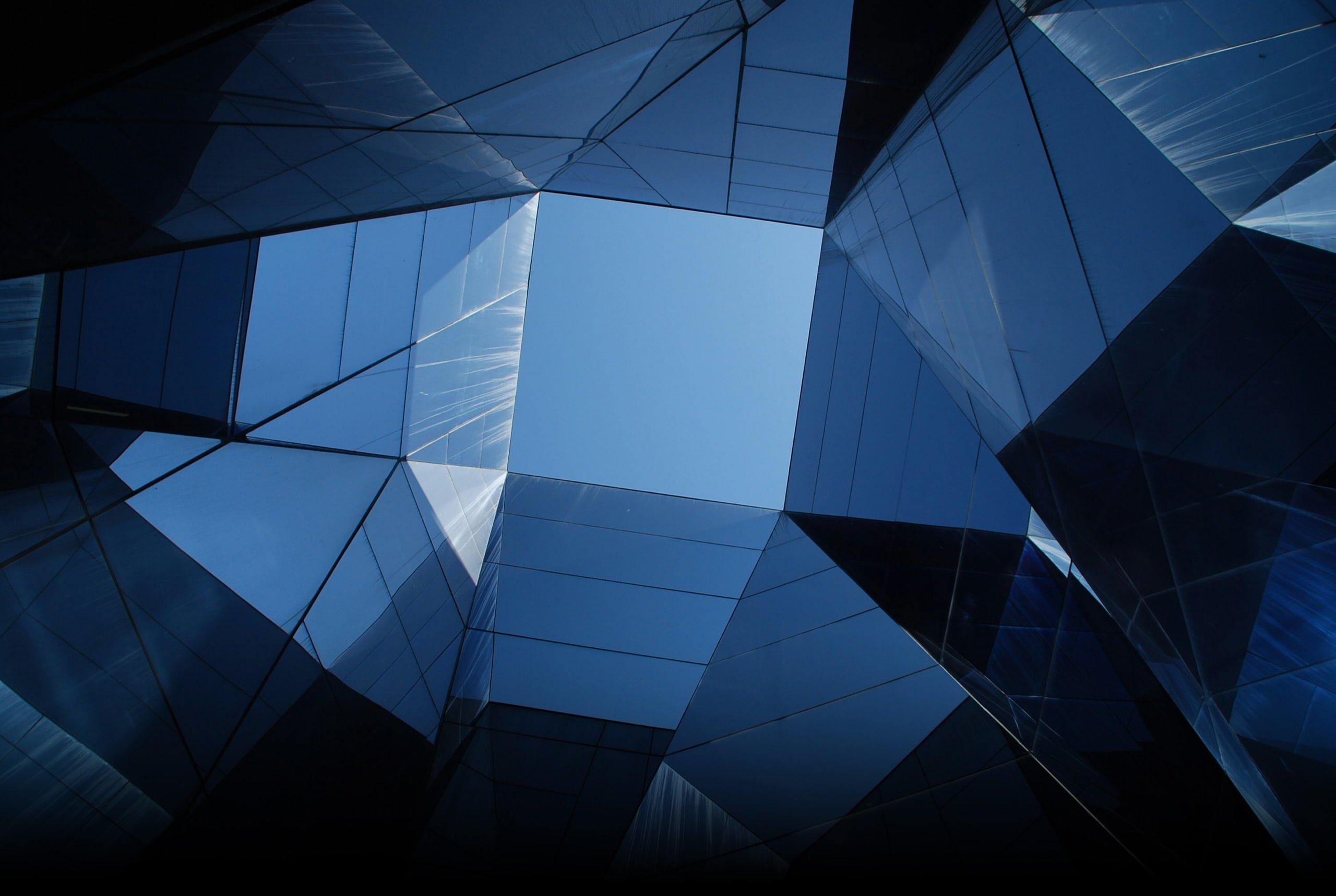 Abstract dark blue glass facets